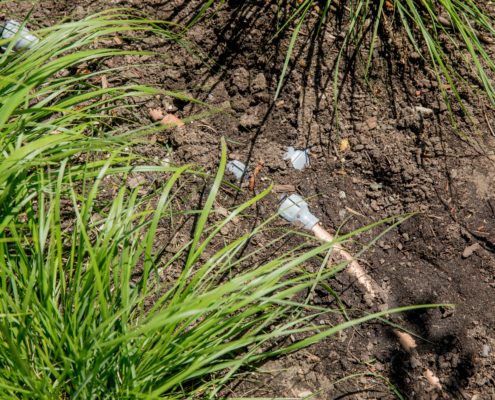unter der Erde verlegte Wasserleitungen